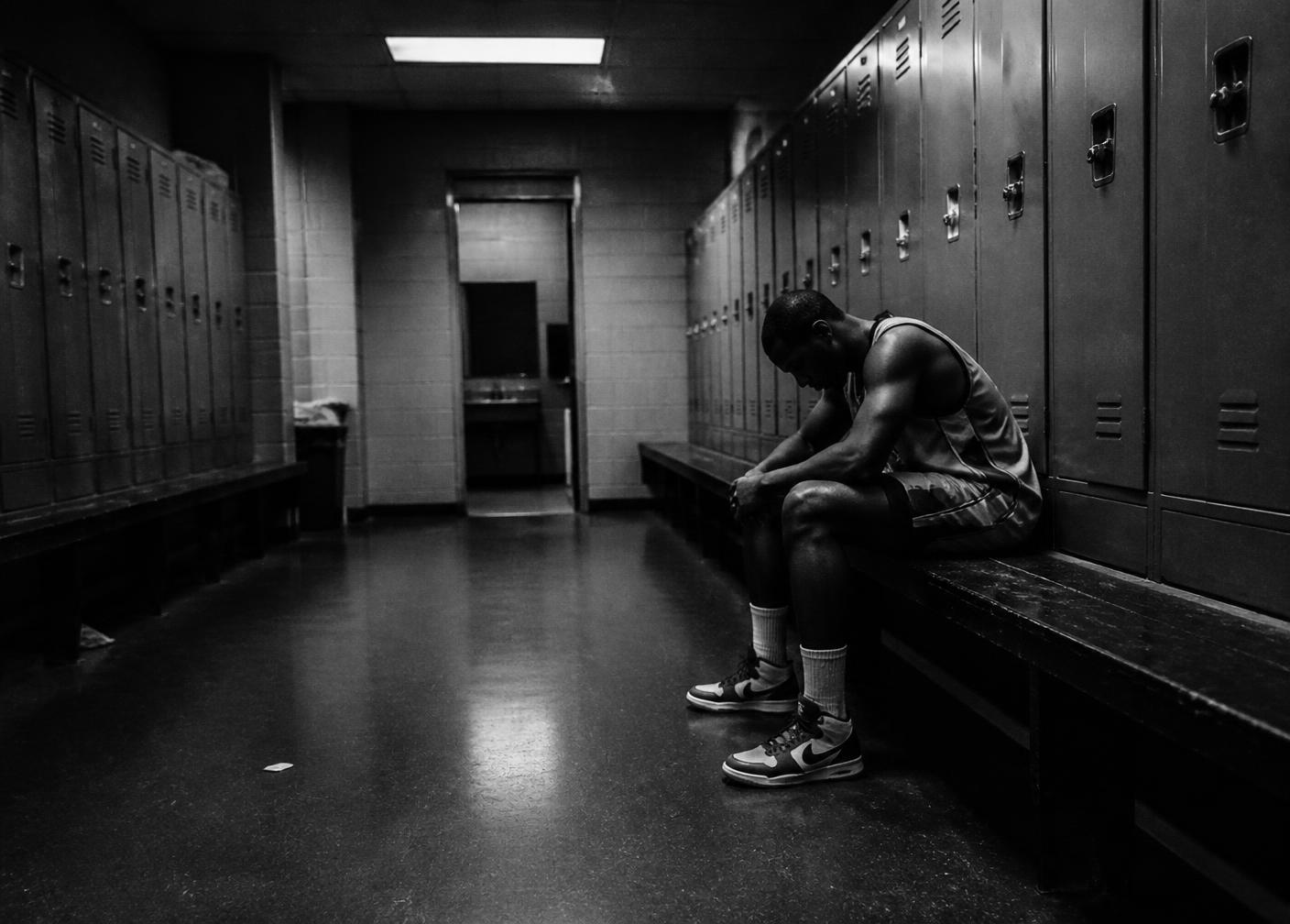 Athlete alone in a locker room